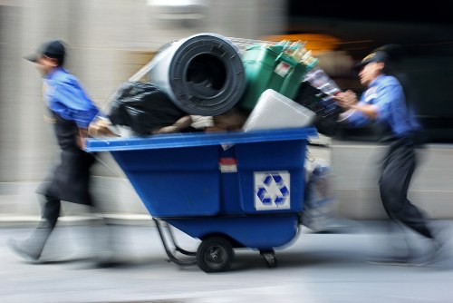 Workers managing demolition waste